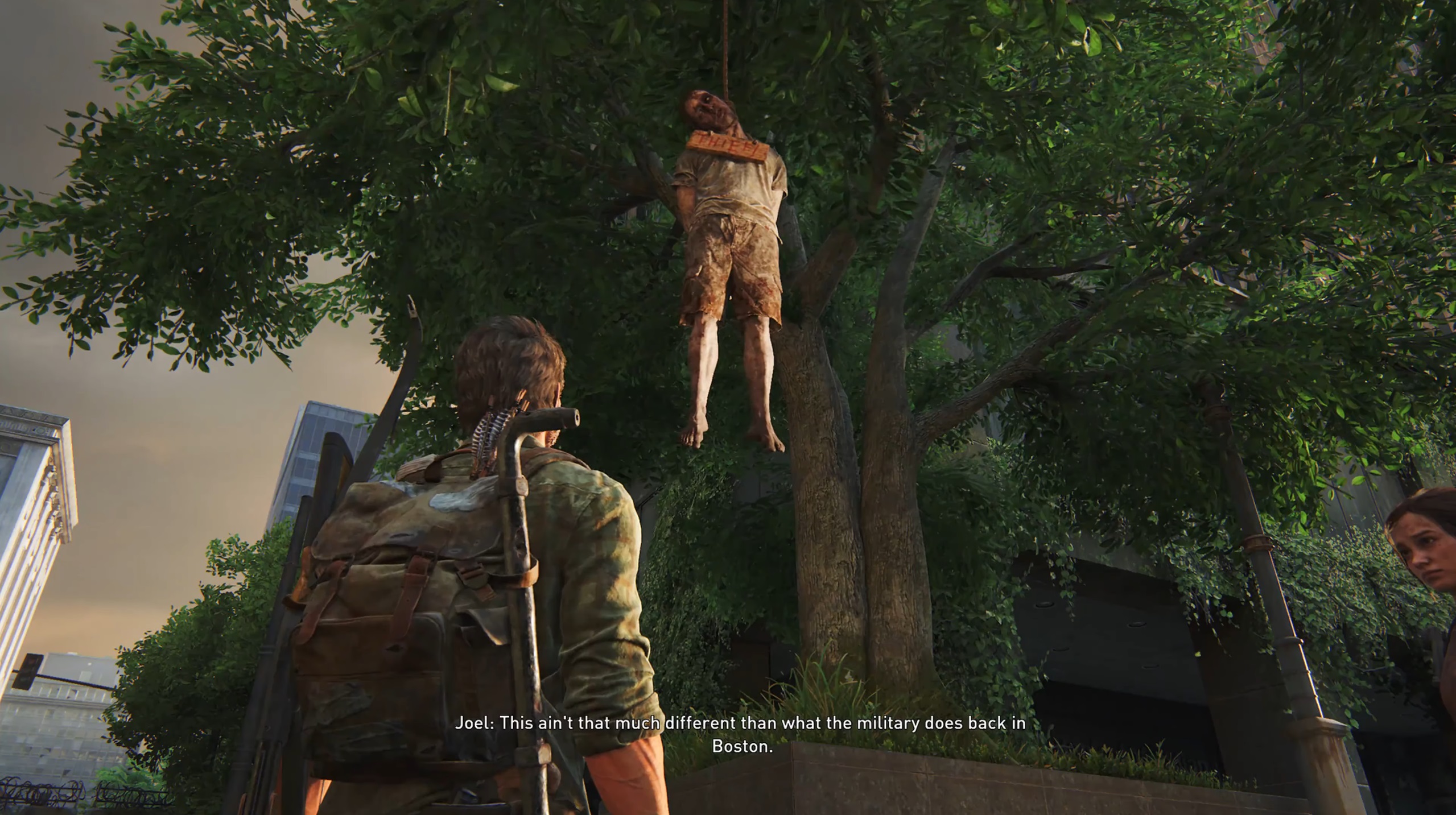 Джоэл смотрит на повешенного человека в The Last of Us Part 1